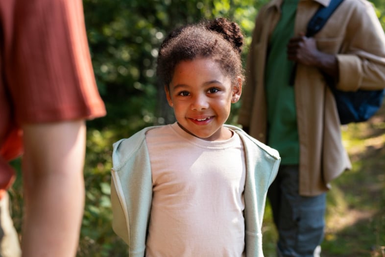 Young black girl looking at the camera